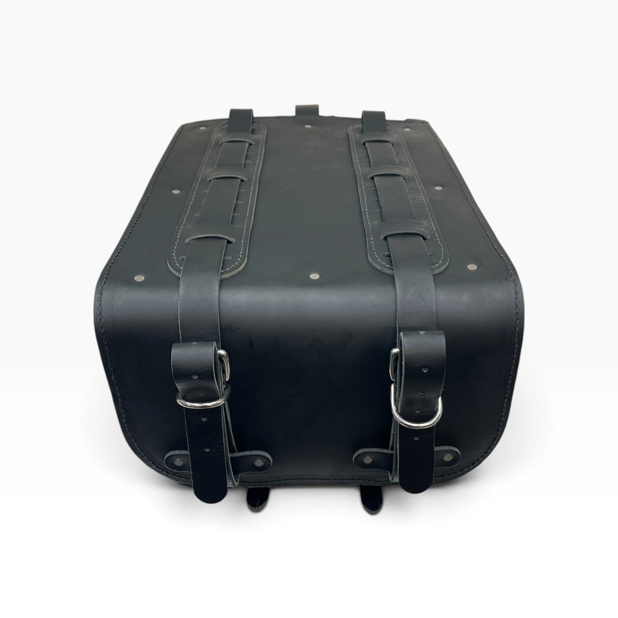 A black leather saddlebag-style case with two vertical leather straps and buckle closures on the front, photographed from above on a plain white background.